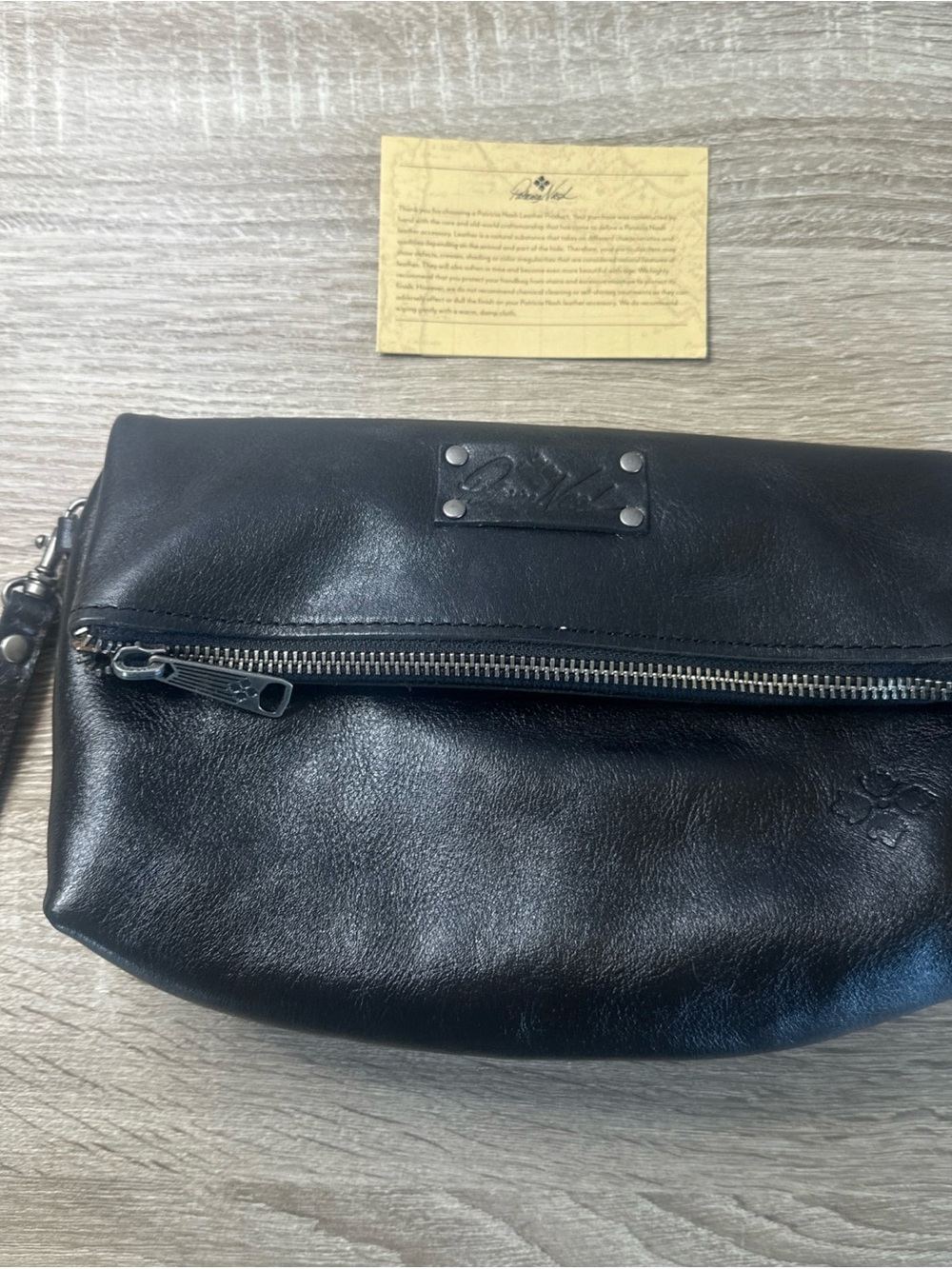 Patricia Nash Valerie Blk fold-over wristlet clutch w a detachable wrist strap